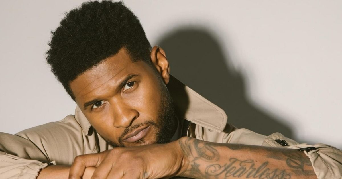 Os fãs ficarão curiosos se Usher estiver em uma loja de verdade da Prada no meio do nada