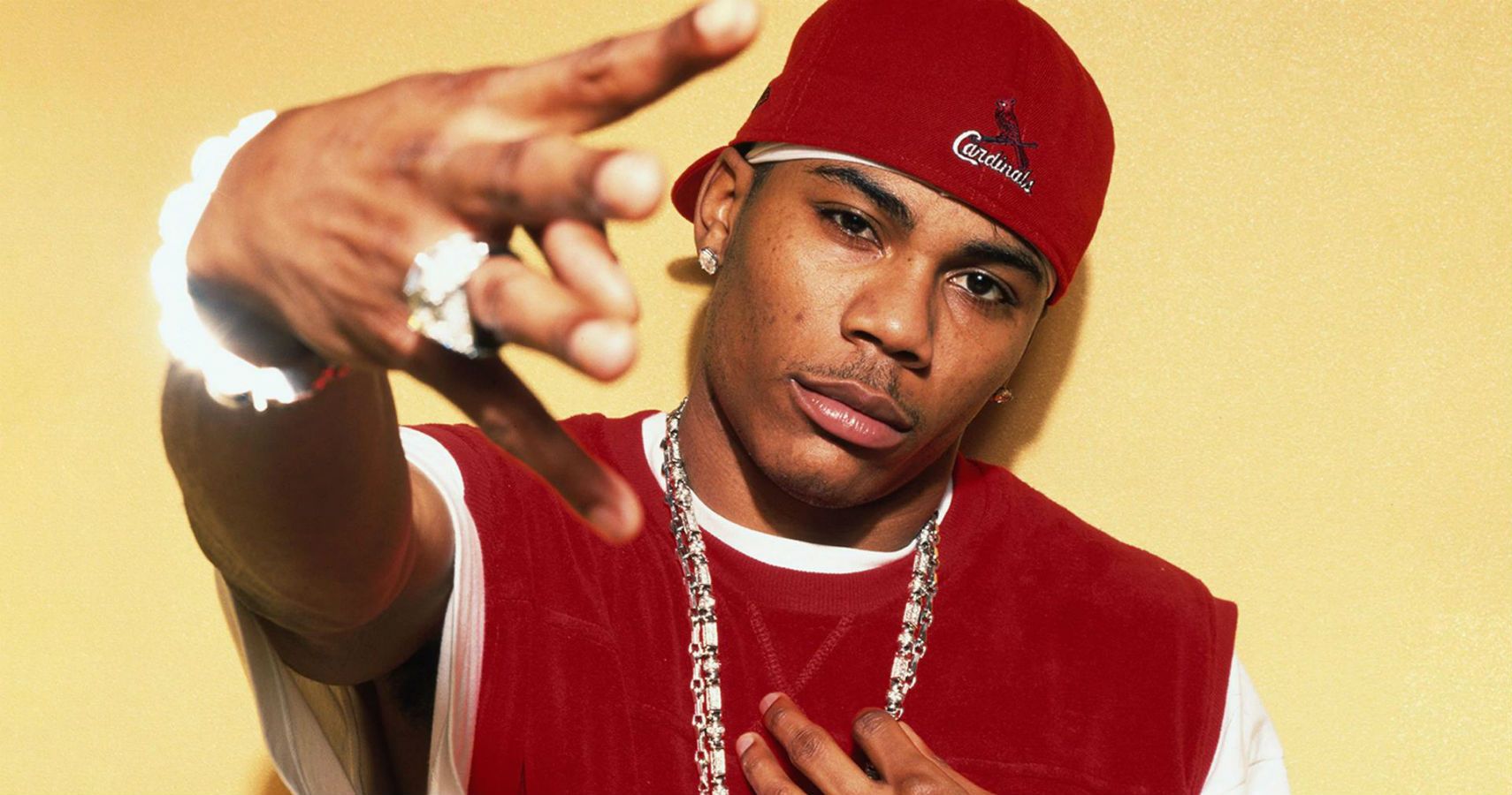 O que é artista de rap, valor líquido de Nelly?