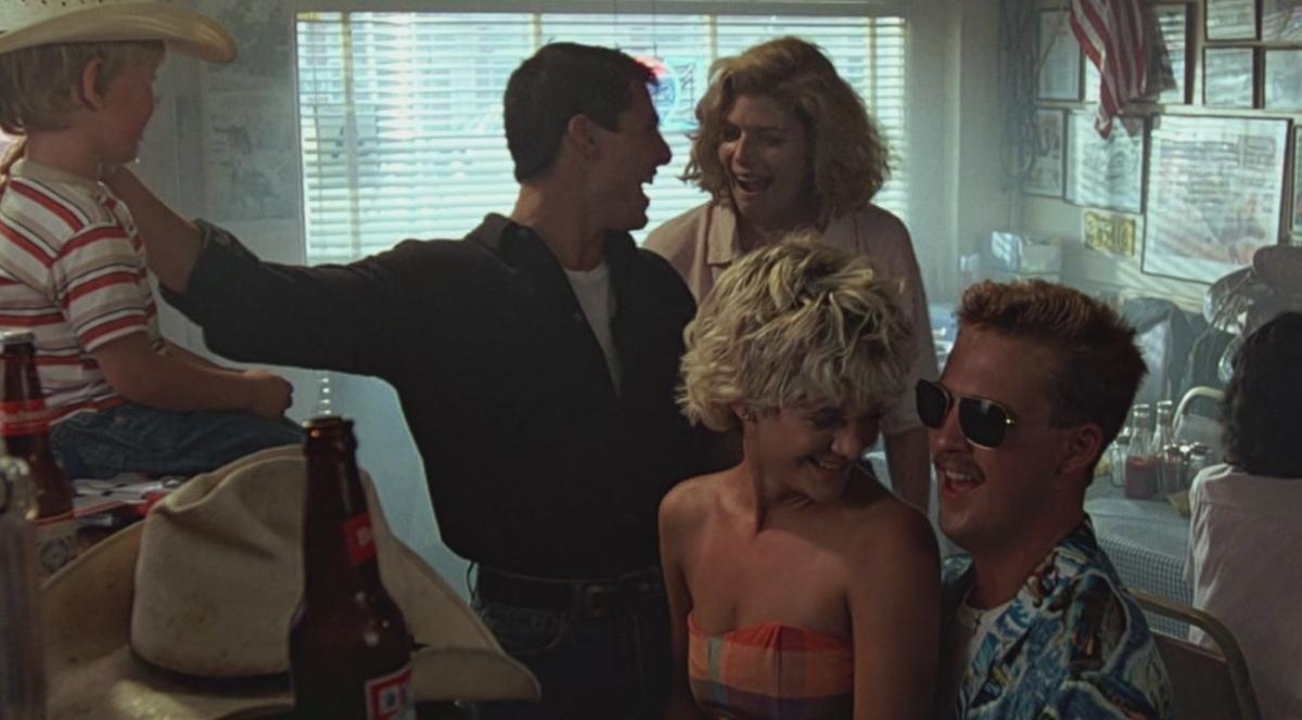 Tom Cruise, Kelly McGillis, Meg Ryan e Anthony Edwards em Top Gun